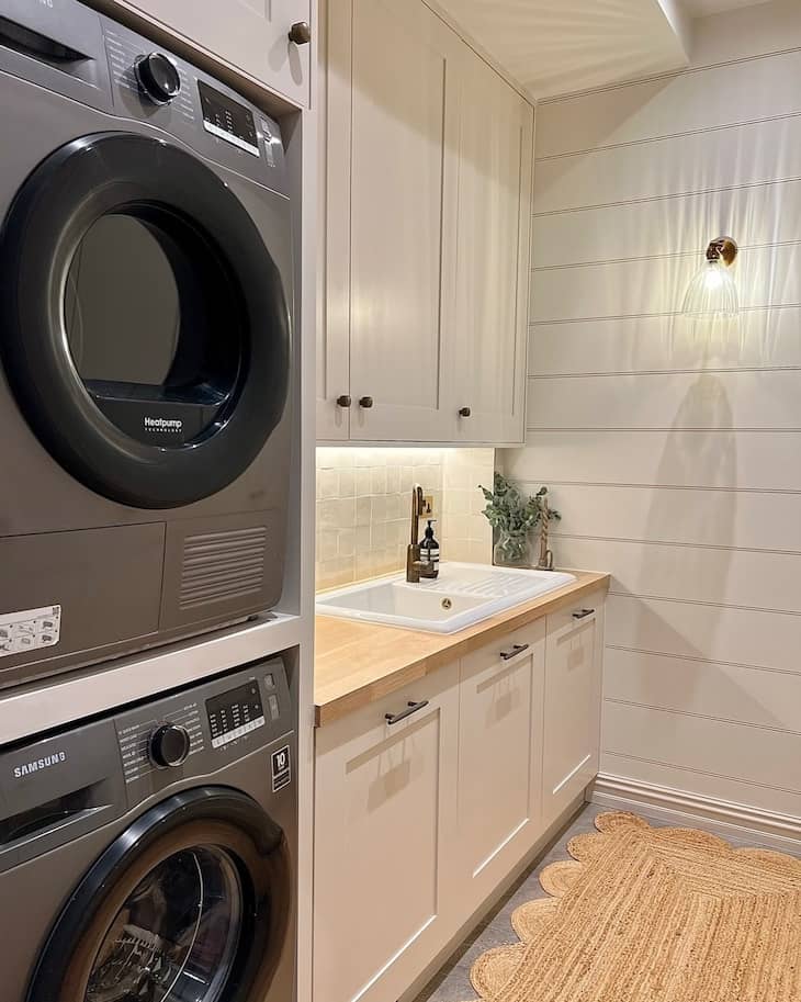 Compact Laundry Layout With Stacked Machines