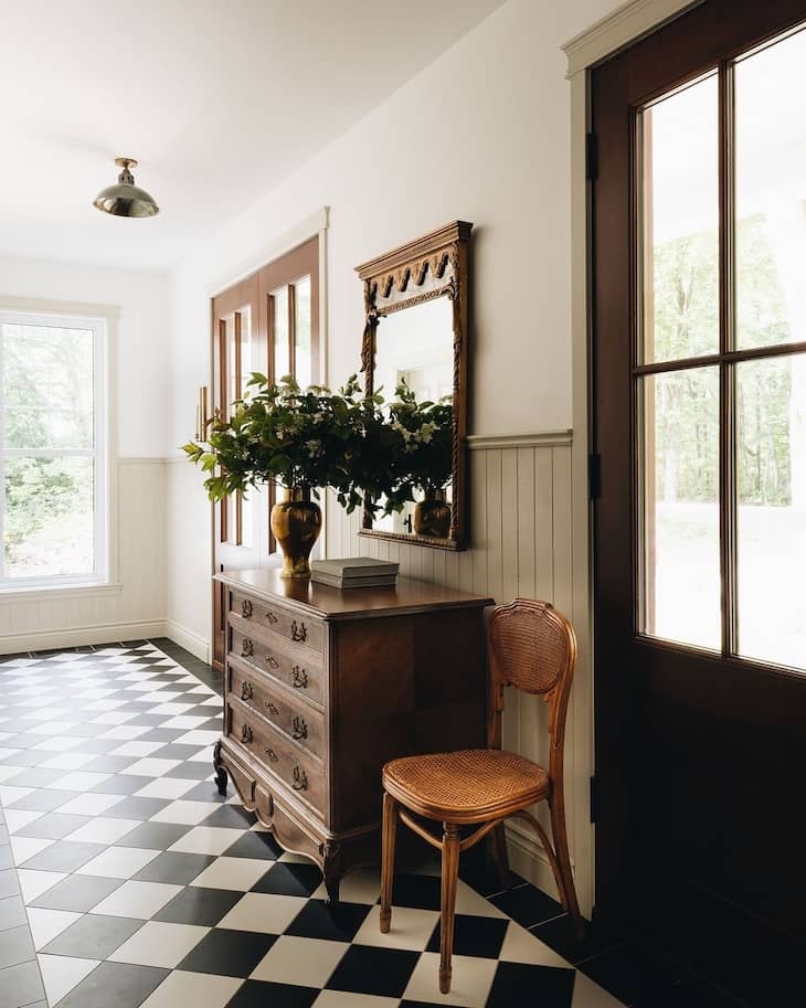Vintage-Inspired Checkerboard in a Charming Entry Hall