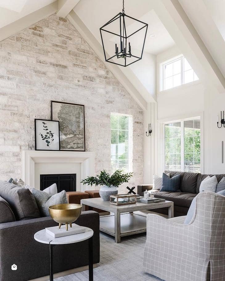 Light Brick Accent Wall with Vaulted Ceilings