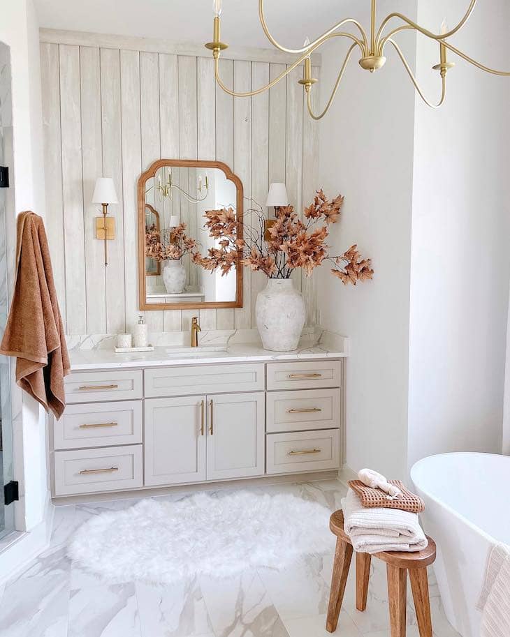 Soft Neutral Vanity With Warm Gold Finishes