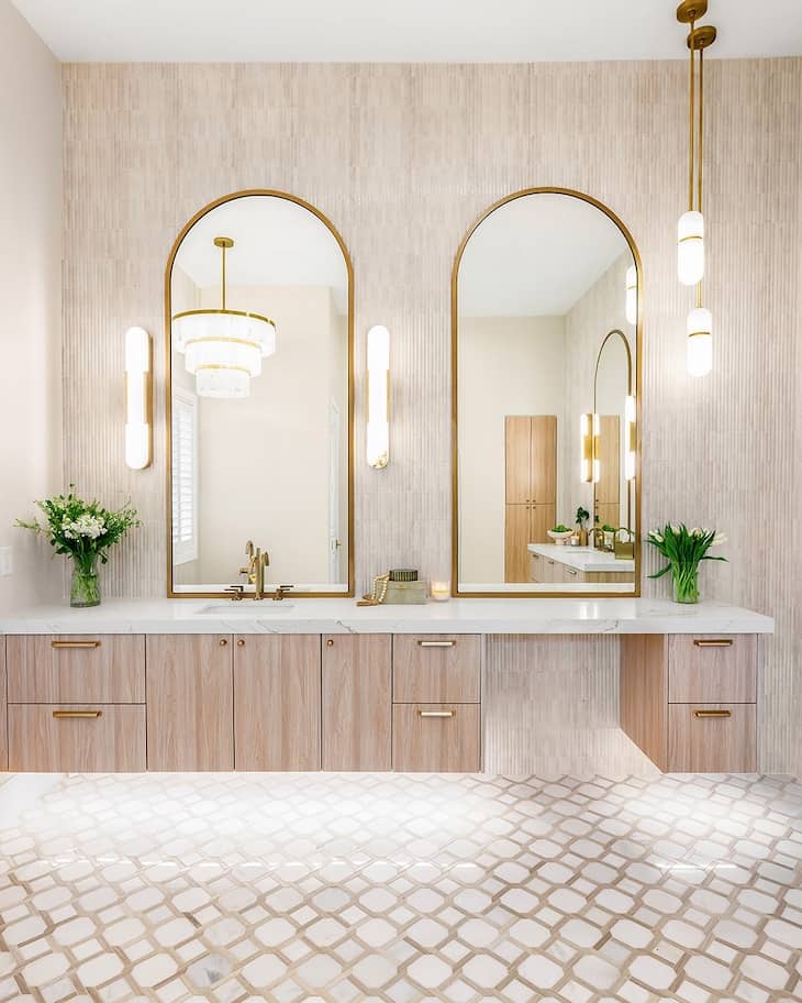 Elegant Vanity With Arched Mirrors and Soft Neutral Finishes