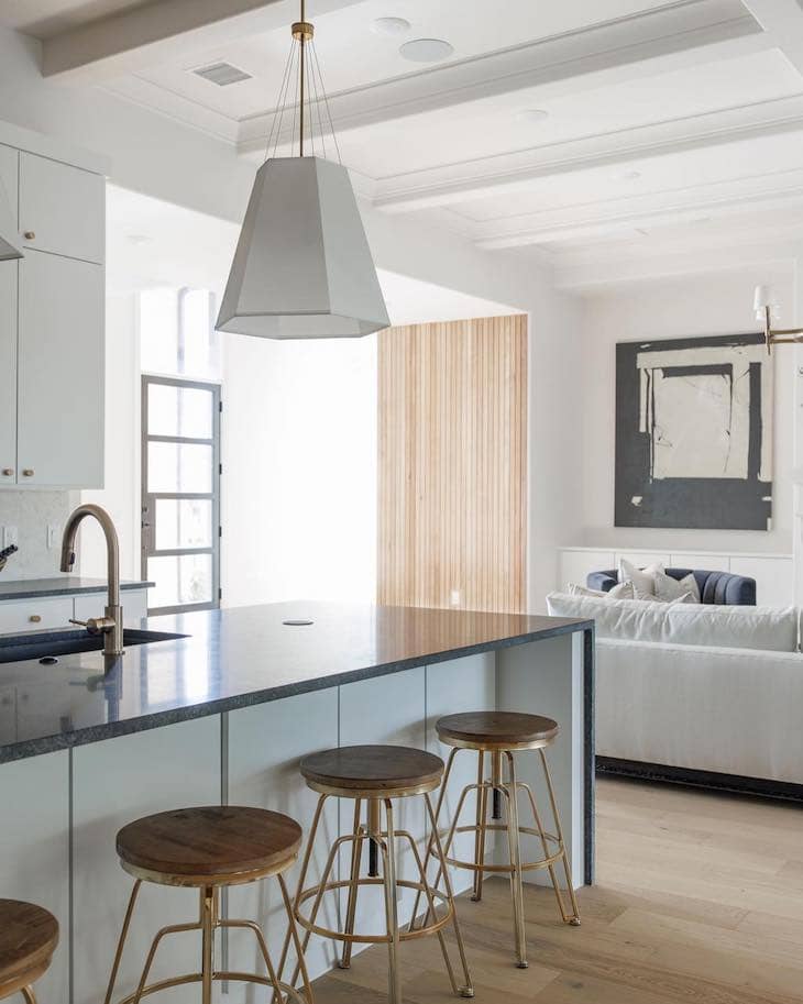 Sleek Black Countertops in a Light and Airy Kitchen