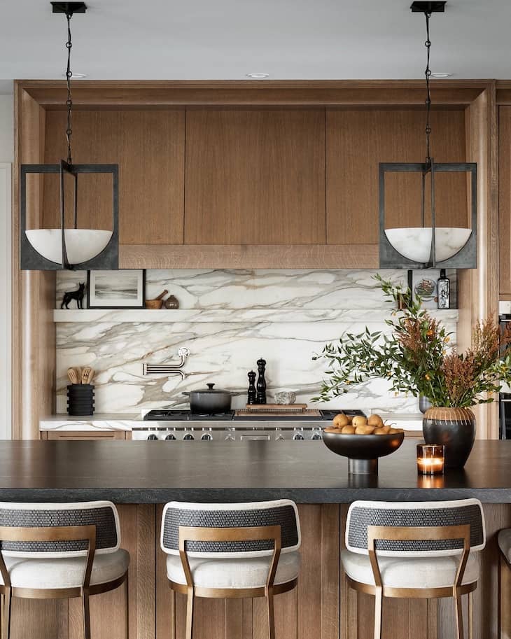 Black Countertops With Warm Wood and Marble