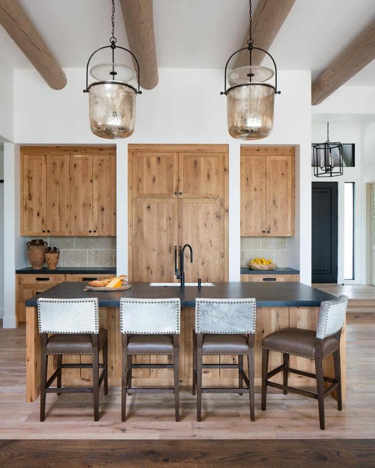 Black Countertops With Warm Wood Cabinets