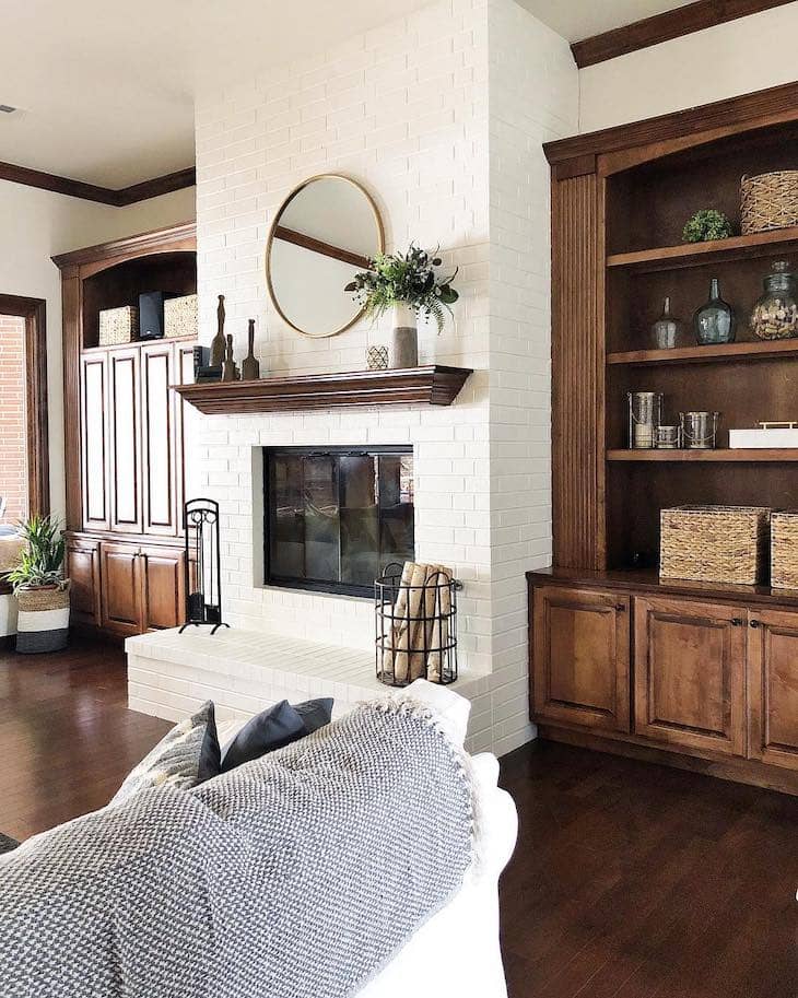 White Brick fireplace with Rich Wood Tones